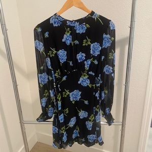 FreePeople blue rose dress that’s flowy and light yet cinches on the sides